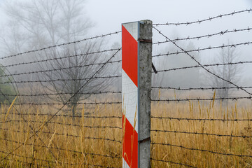 Fototapeta premium Barbed wire fence at the Chernobyl exclusion zone, Ukraine