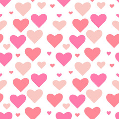 Pink hearts different sizes on white background. Seamless vector pattern.