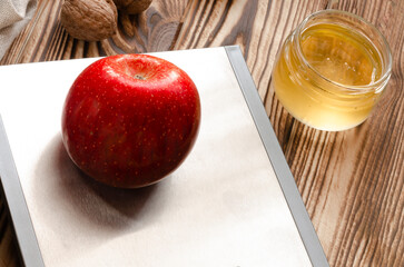 Healthy eating. Dietary nutrition. Apples, cottage cheese, honey and nuts are on the wooden table