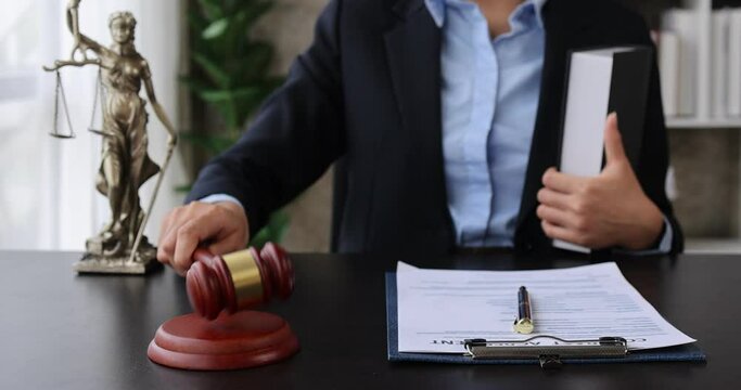 justice and law concept - judge in a courtroom with the gavel, slow motion	