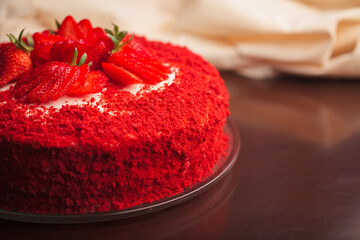 Beautiful red cake with strawberries and cream
