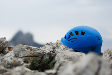 Rock climber's helmet on the mountain, the concept of climbing and sports.