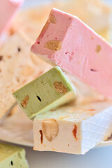 Nougat with nuts of different colors