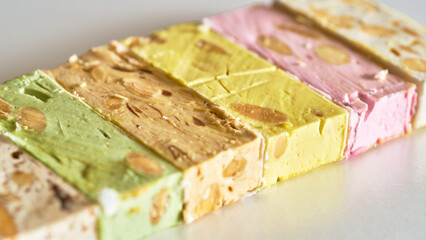 Nougat with nuts of different colors