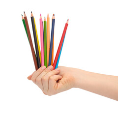 Multi-colored pencils for drawing in a female hand.