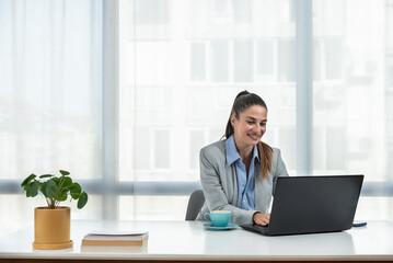 Young woman health care worker psychologist and psychotherapist talking online on web conference video call about how to reduce stress and anxiety in everyday life. Female expert telemedicine.