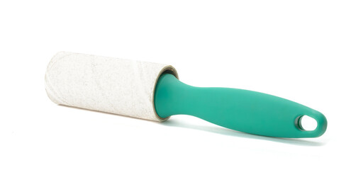dirty clothes roller with green handle on white background