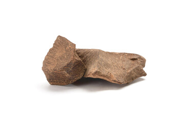 a large piece of natural cocoa chocolate on a white background