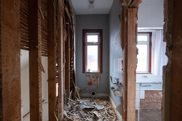 Building work underway in a suburban Edwardian house in Pinner, northwest London UK. The builder is...