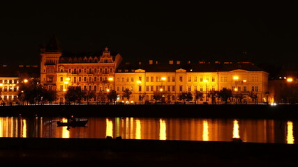 Fototapeta na wymiar night Prague, illuminated Vltava Embankment