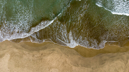 Top View of Sea Foam and Shoreline Texture