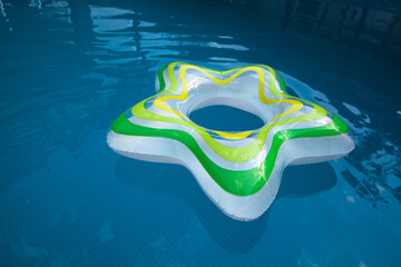 inflatable circle in a swimming pool with clear water