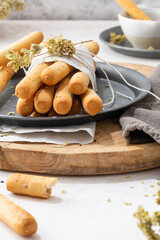 Bread sticks with sesame seeds.