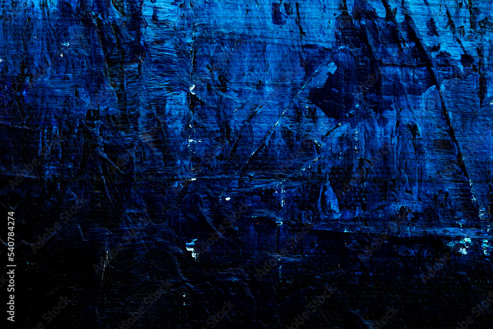 Poster macro close-up of an abstract black and blue acrylic paint background. high resolution full frame te
