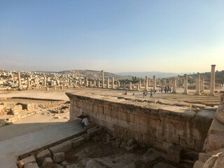 Jerash, Jordan, November 2019 - A stone bridge over a body of water