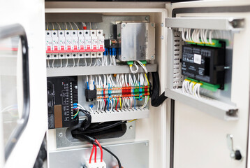 Voltage switchboard with circuit breakers. Engine or pump control Cabinet. Assembly, inspection....