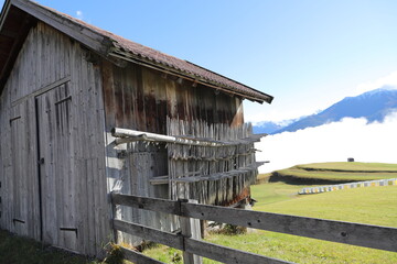 an old little crooked hut in the alps