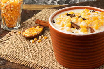 Brazilian canjica made with corn, cinnamon and coconut flake.