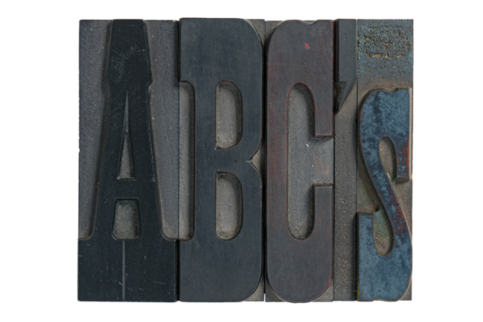 Isolated vintage antique wood letterpress type ABCs