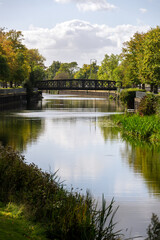 Fototapeta na wymiar Disused metal railway bridge over the river Welland In Spalding, Lincolnshire, East Midlands, England