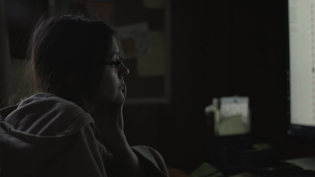 Young Female Office Employee Carries Out Daily Tasks at Her Desk 4K