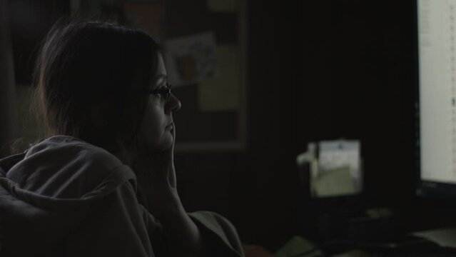 Young Female Office Employee Carries Out Daily Tasks at Her Desk 4K