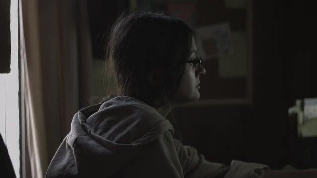 Young Female Office Employee Carries Out Daily Tasks at Her Desk 4K