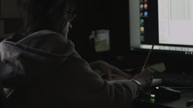 Young Female Office Employee Carries Out Daily Tasks at Her Desk 4K