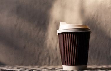 Paper coffee cup in coffee shop