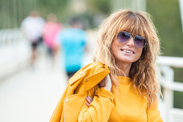 portrait of middle aged woman outdoors