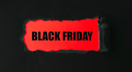 Black Friday text in red text field. Black Friday text inside torn paper.