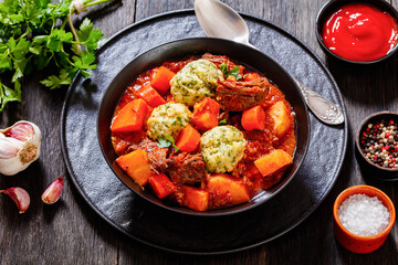 Beef Stew with Dumplings in bowl, top view