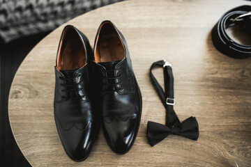 Fototapeta na wymiar Men's accessories with luxury shoes. Top view