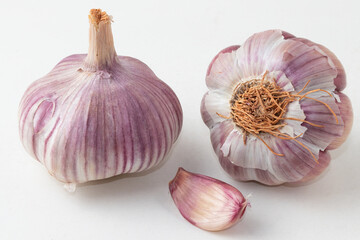 Garlic cloves isolated on white background.