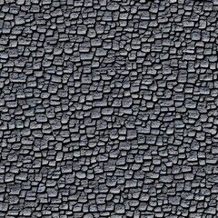The asphalt is a smooth, dark grey with lighter grey streaks throughout. It's textured surface is...