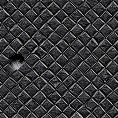 A black and grey asphalt road under a cloudy sky. The texture of the pavement is smooth and even.