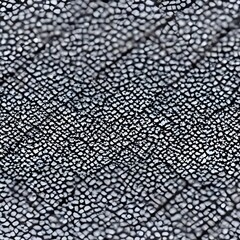 The asphalt is a dark black color with a smooth texture. It looks like it would be soft to the...