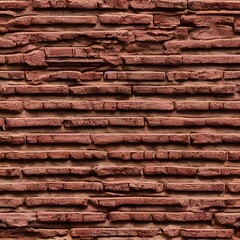 The seamless bricks texture is a image of many small, identically sized and shaped red bricks. They are all neatly arranged in rows and columns with slight variations in color. The background is white