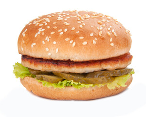 Tasty fast food burger with beef, onion, cucumbers and salad american style