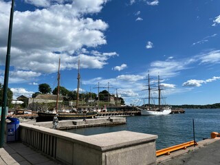 Beautiful shot of a pier with vintage pirate ships in Oslo, Norway