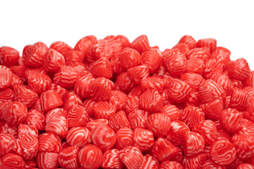 Red round tasty gummy candies as a background.