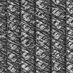 The picture is of a seamless metal texture. It's smooth and shiny, with a repeating pattern. The background is different shades of grey, making the metal stand out.