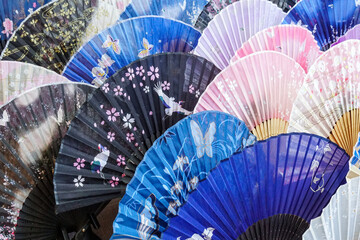 Japanese traditional sensu fans in different patterns