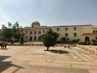 Jaipur, India, November 2019 - A building that has a sign on the side of a road