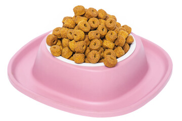 Dry food for pets. Balanced feeding for cats and dogs in a pink bowl.
