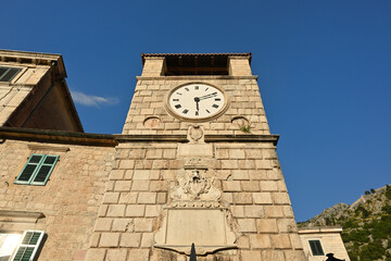 Fototapeta na wymiar Clock tower in Old Town of Kotor in Montenegro