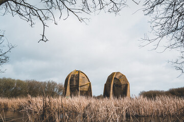 The concrete sound mirrors of Denge (Dungeness) in the south east of England. Pre World War 2 structures used to detect airplanes at a distance.