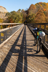 Mountain bike on reclaimed railroad bridge.