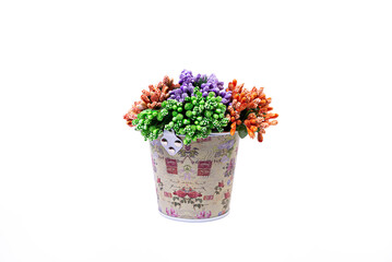 aluminum ice bucket laid in wait for use. stainless multi-colored bucket with green blue flowers