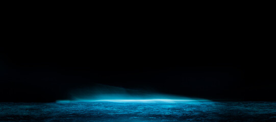 Abstract image of dark room concrete floor. Black room or stage background for product placement.Panoramic view of the abstract fog. White cloudiness, mist or smog moves on black background. 